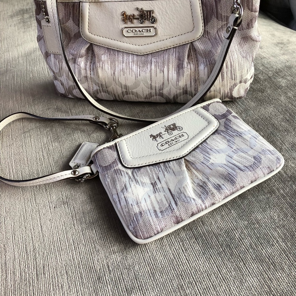 Coach white/silver wristlet.